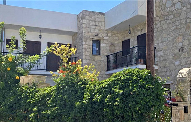 Parekklisia and Pyrgos: Stone Houses, Vintage Cars and Wastelands